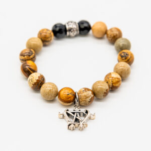 Beaded bracelet with ornate charm.