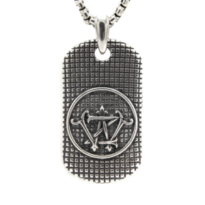Silver pendant with a textured rectangular base and circular emblem featuring a symbolic design, attached to a chain.