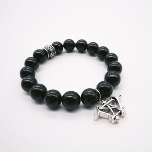 Black beaded bracelet with silver charm.