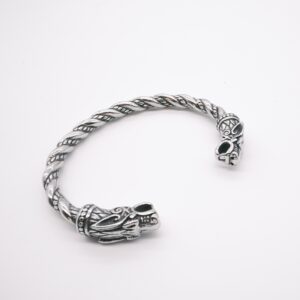 Dragon Bracelet featuring intricately designed dragon heads at each end, set against a plain white background.